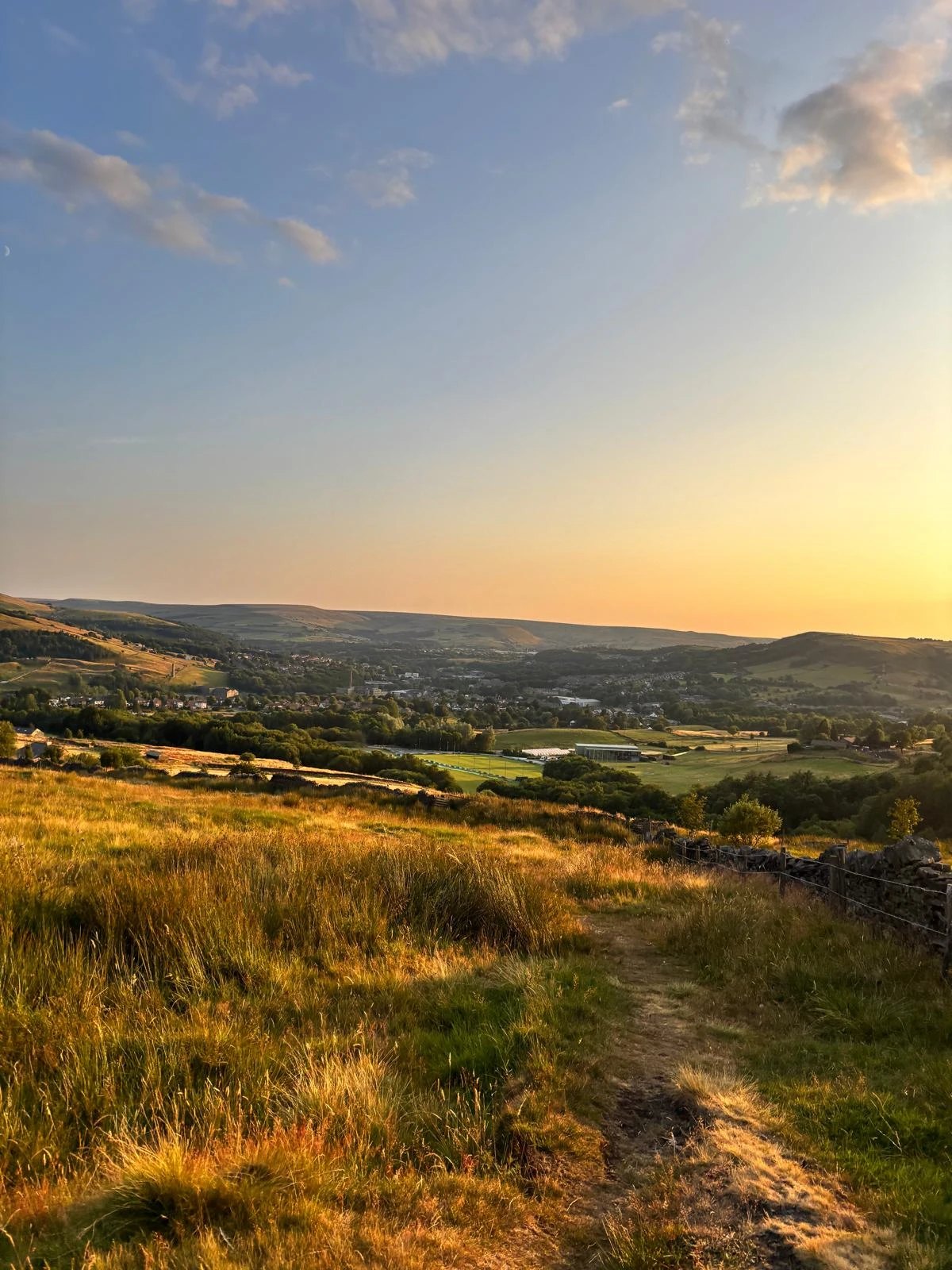 Sunset over the valley from Holcombe Moor, looking down towards Ramsbottom, Lancashire